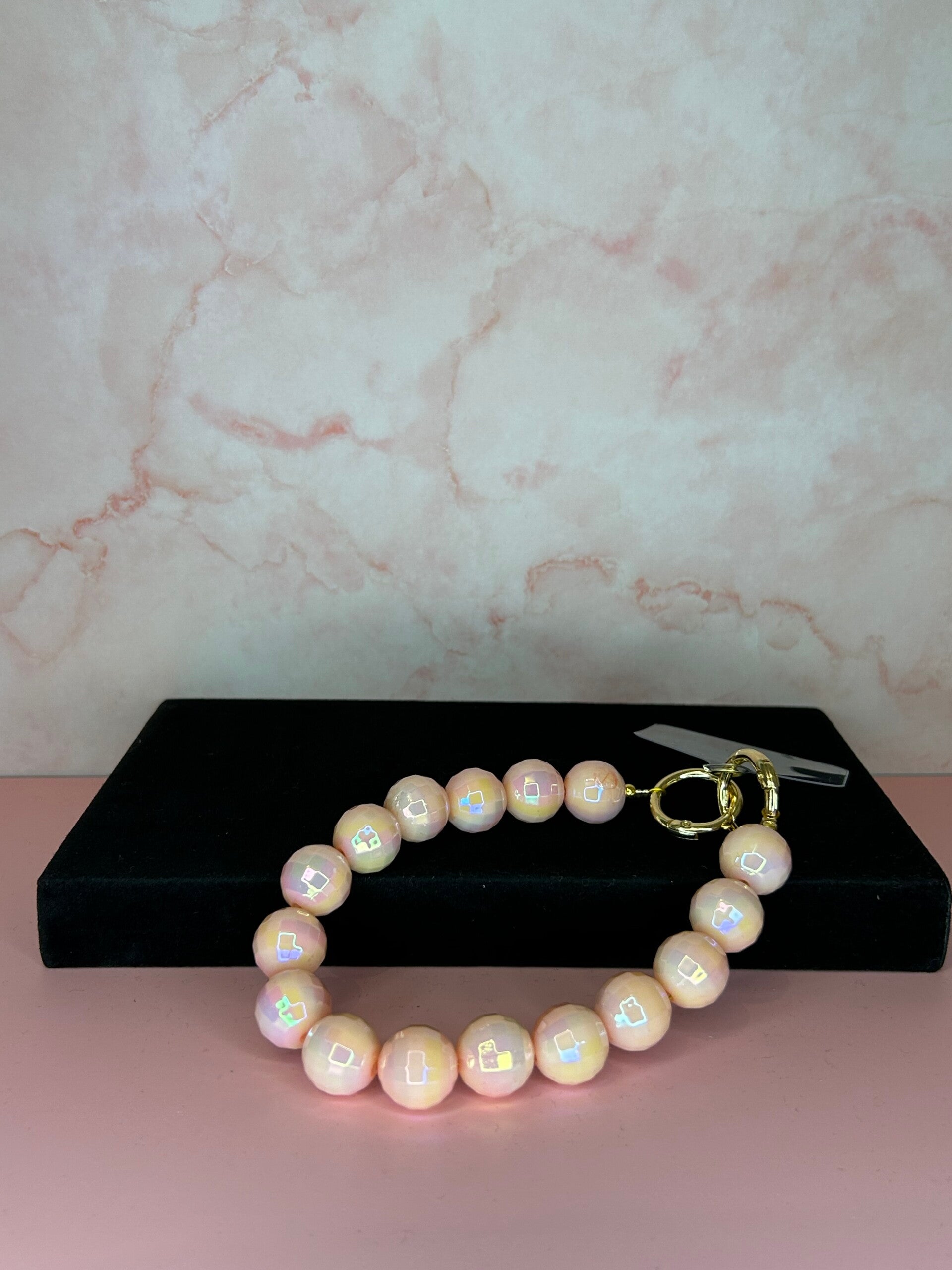 Telefoon handstrap discobal roze