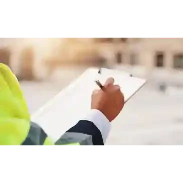Inspection report attached to a clipboard, showing organized checklist and notes