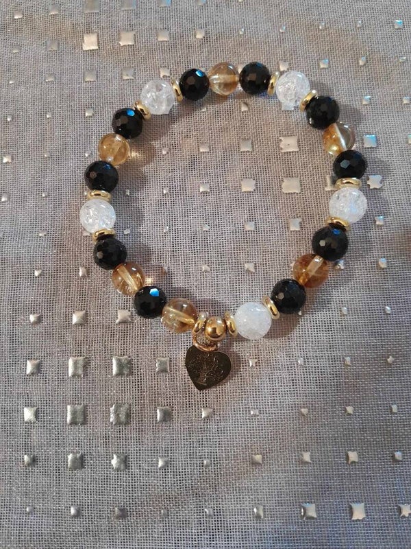 Bracelet en pierres minérales avec intercalaires dorés et charm's