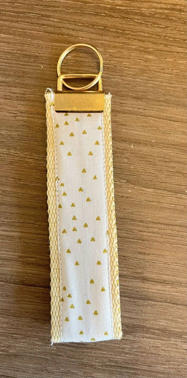 Handgemaakte sleutelhanger wit met gouden glinstering