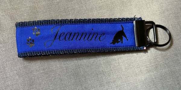 Handgemaakte sleutelhanger blauw met gouden glinster