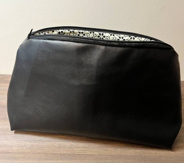 Hangemaakte toiletzakjes in nepleder