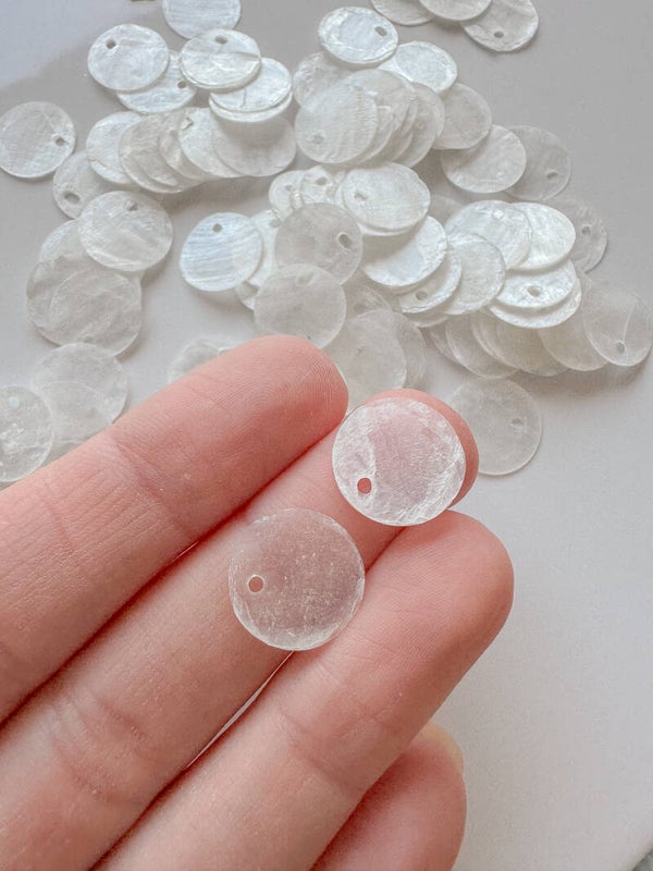 witte schelp rondjes