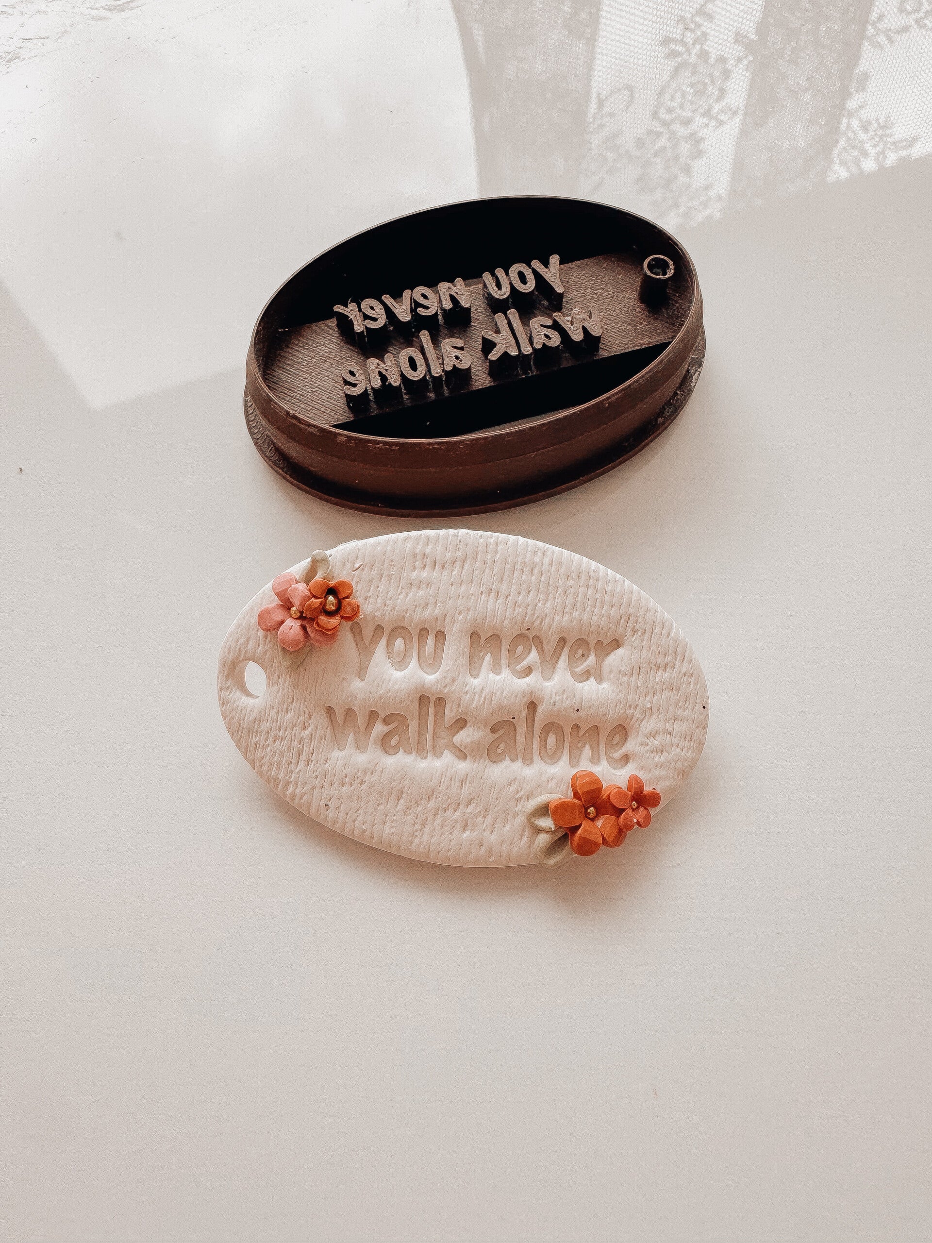 cutter keychain 'you never walk alone'