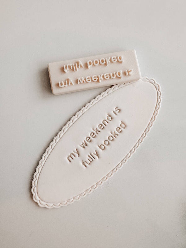Stamp bookmark 'my weekend is fully booked'