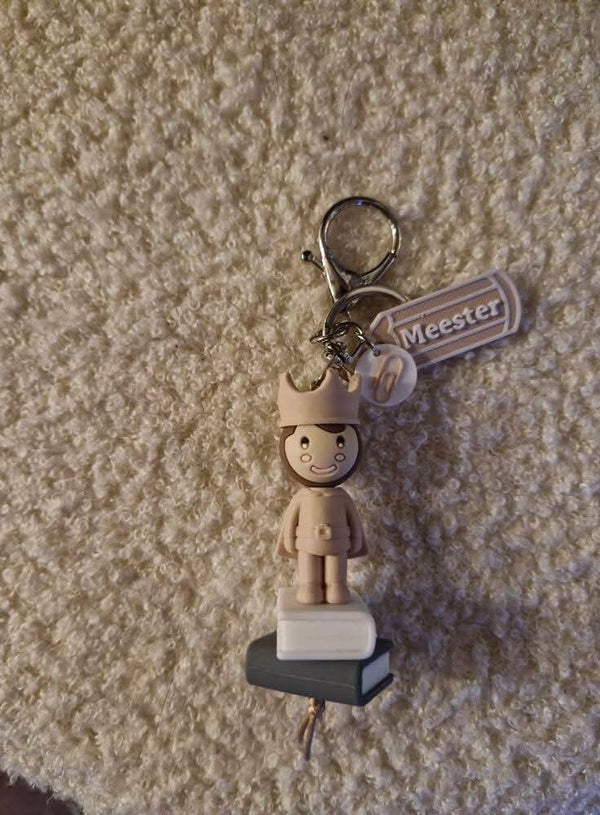 Sleutelhanger meester beige