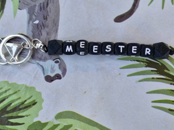 Sleutelhanger meester zwart  met wit