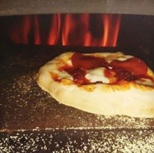 Kachel pizza oven en bbq