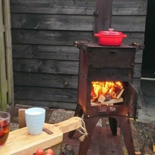 Tuinhaard met BBQ en pizza oven