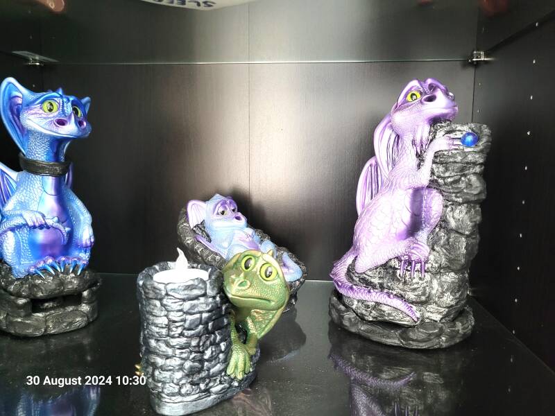 Flint, Sparky, Smokey, Flicker Smoking Dragons