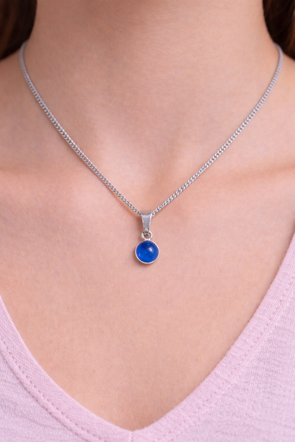 Silver pendants with ashes