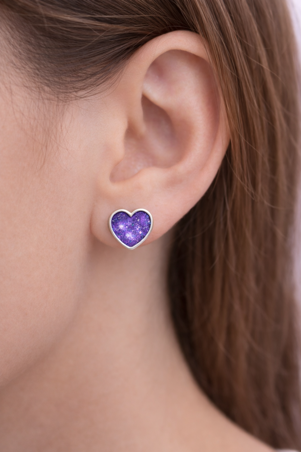 Silver earrings with ashes