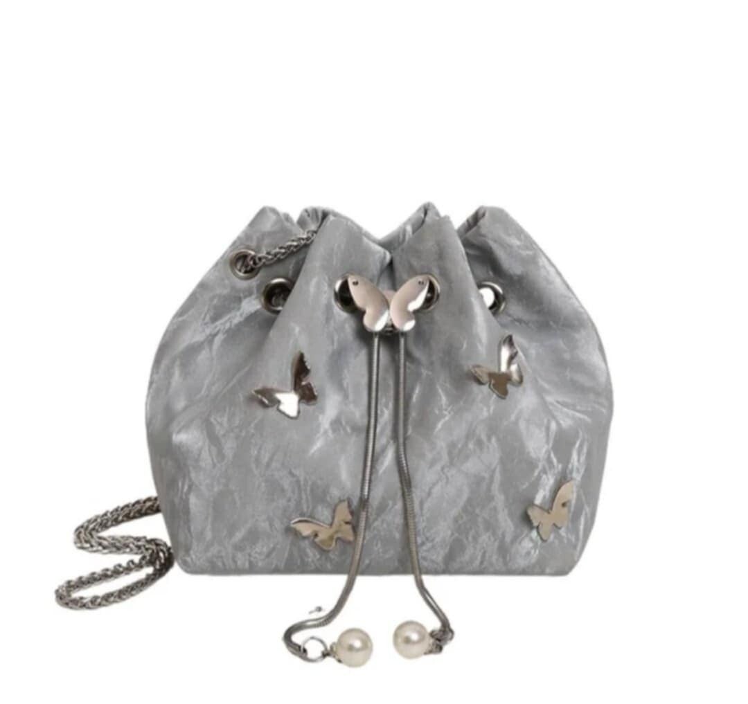 Sac à main bling bling pour femme avec papillons et perles collection 2025