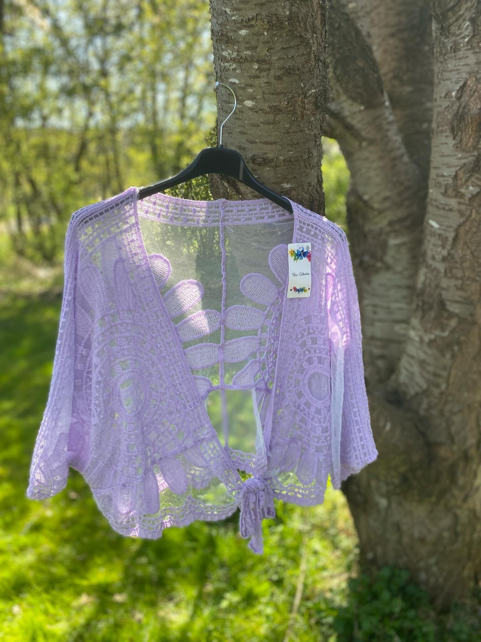 Boléro grande taille mauve clair