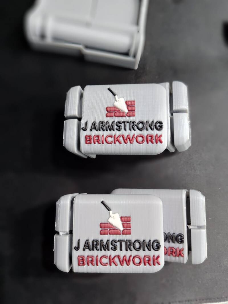 White corner blocks with red-and-black business branding