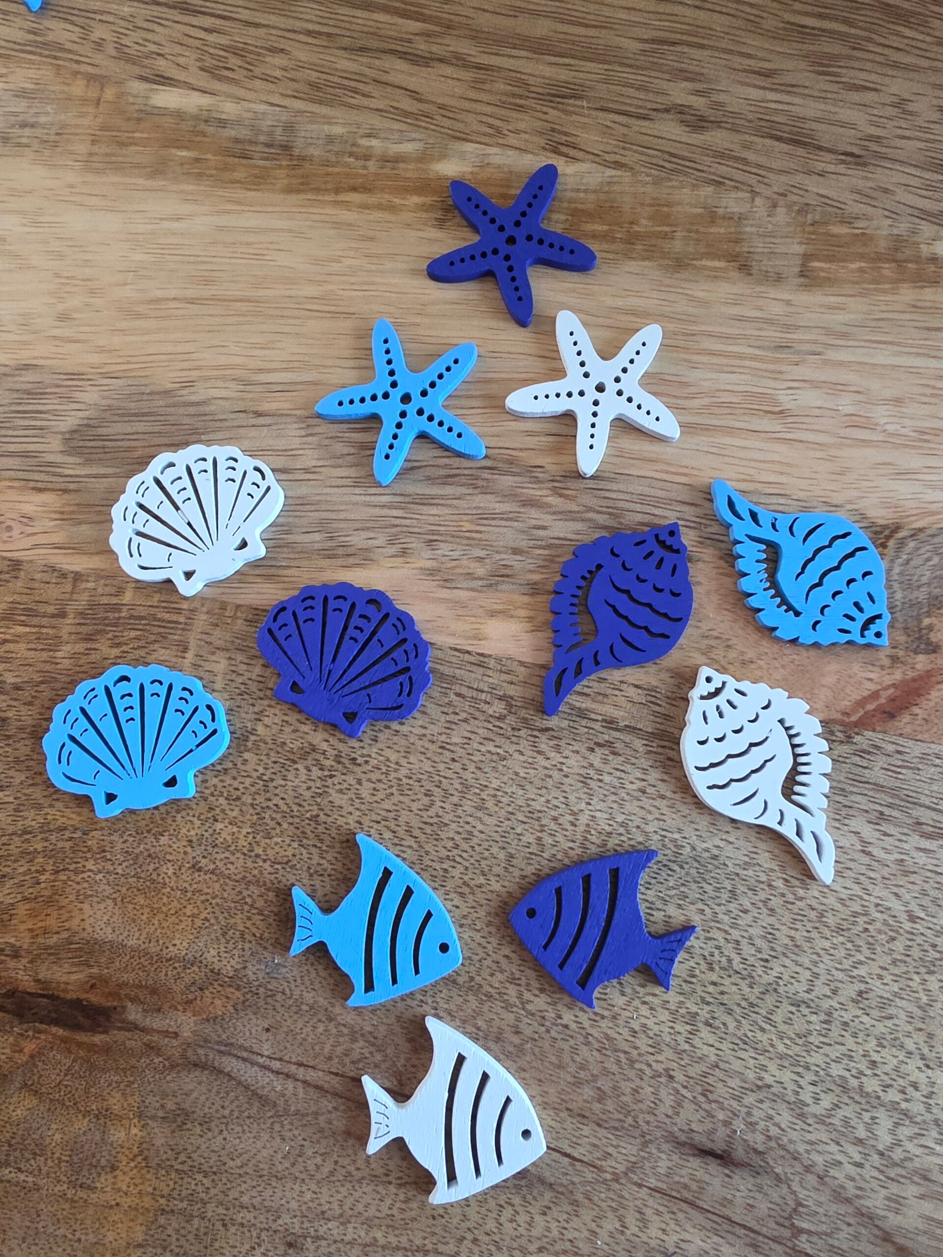 Loose parts, houten zeefiguren