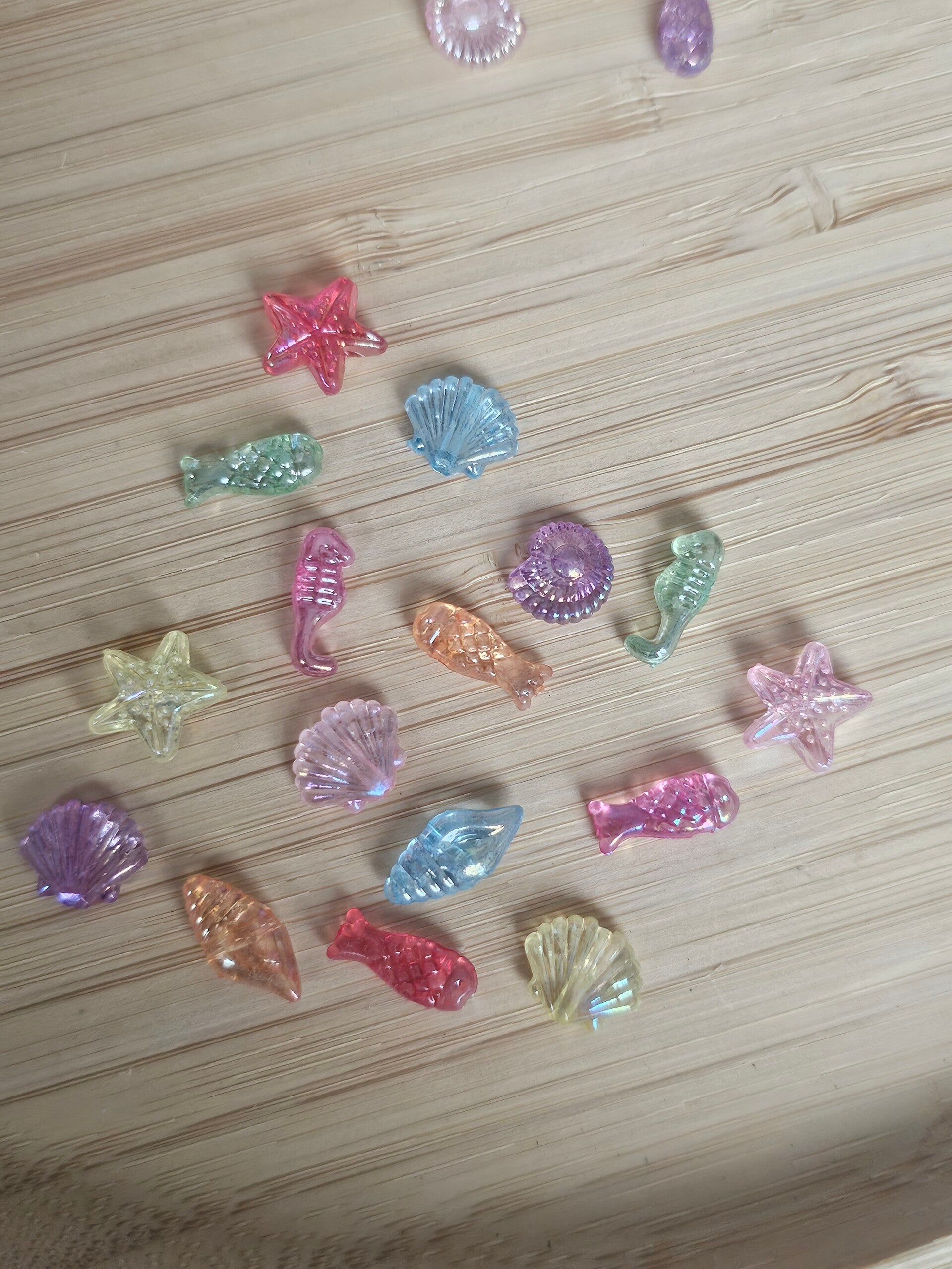 Loose parts, mini zeefiguren regenboog