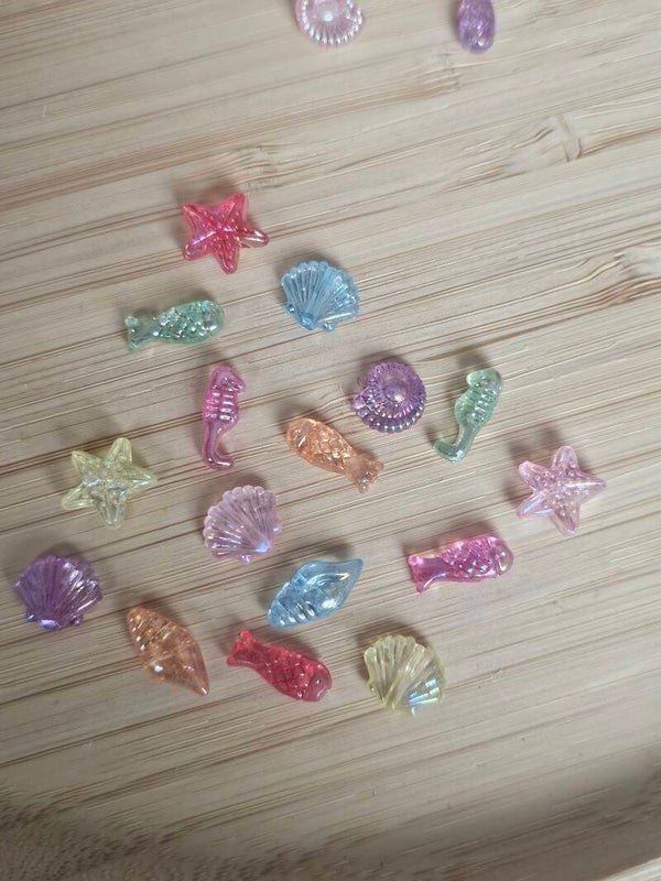 Loose parts, mini zeefiguren regenboog