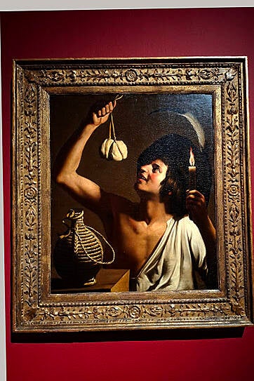 gerard-van-honthorst-een-kwajongen-die-kaas-onderzoekt-standard.jpg
