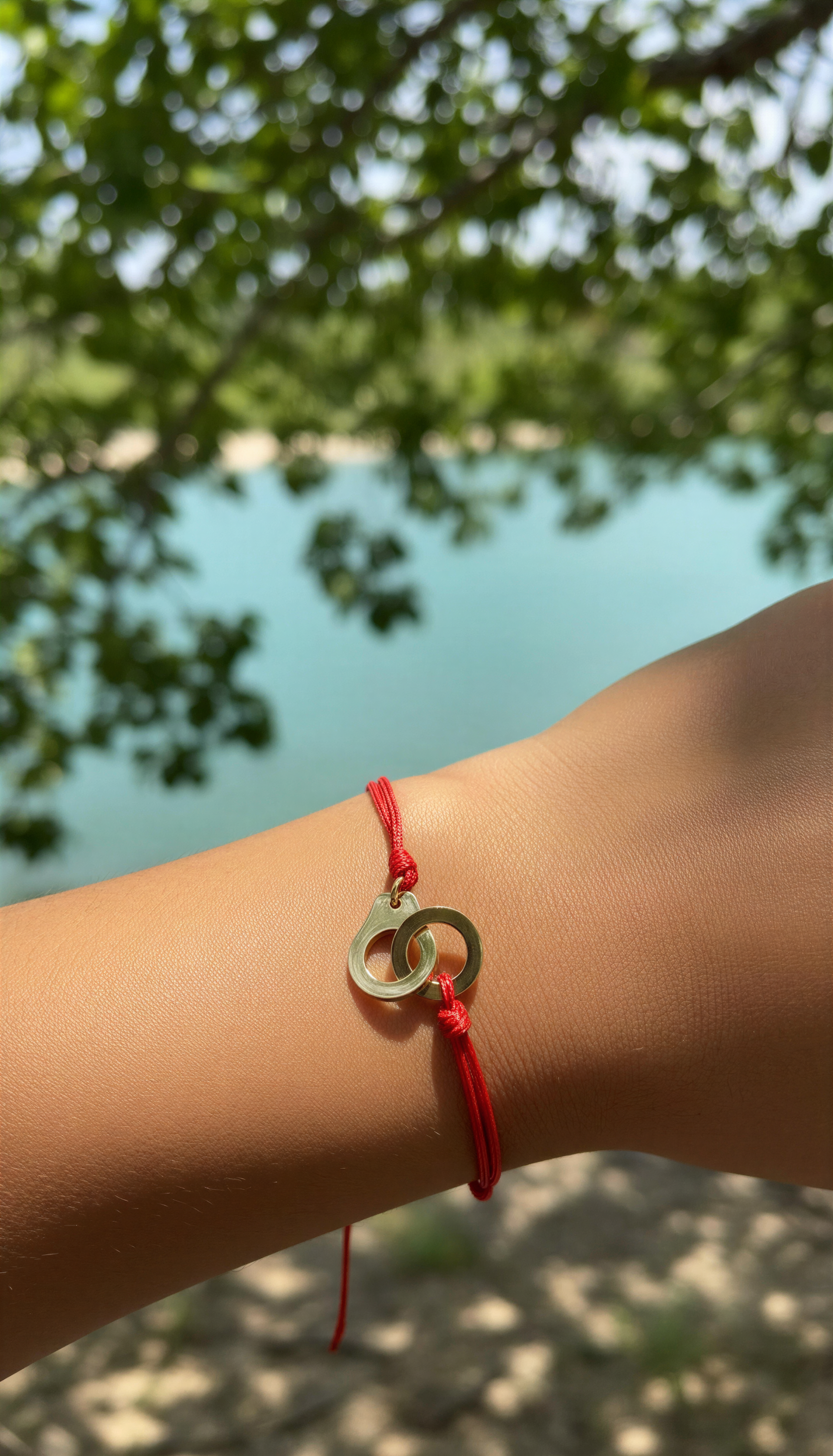 Red String Bracelet with Gold Interlocking Rings – Adjustable Stainless Steel Charm