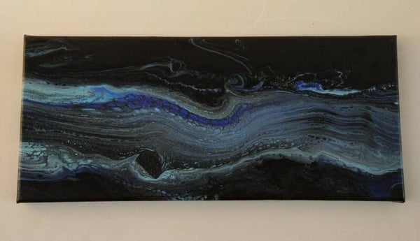 Black and grey pouring