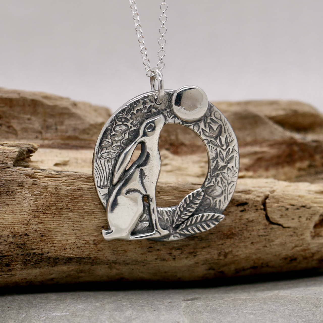 Flower sprig pendant