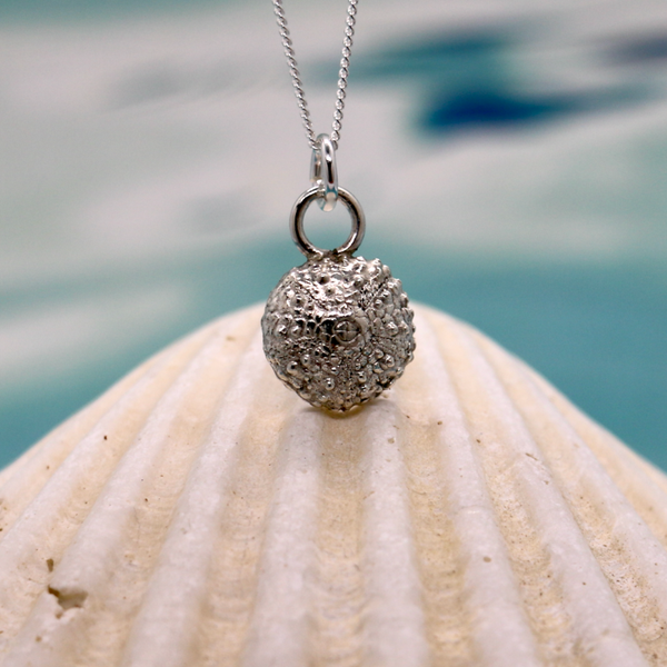 Silver sea urchin charm necklace