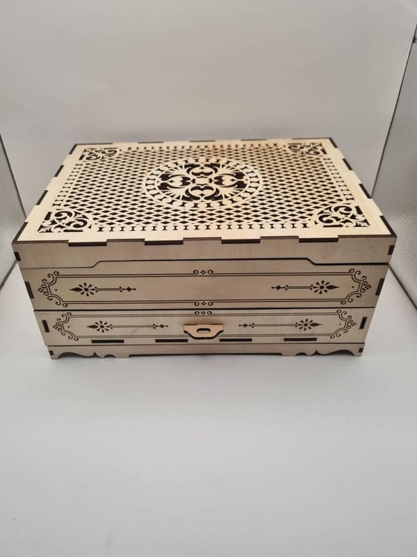 Boîte à Bijoux en Bois Sculpté – Élégance et Organisation