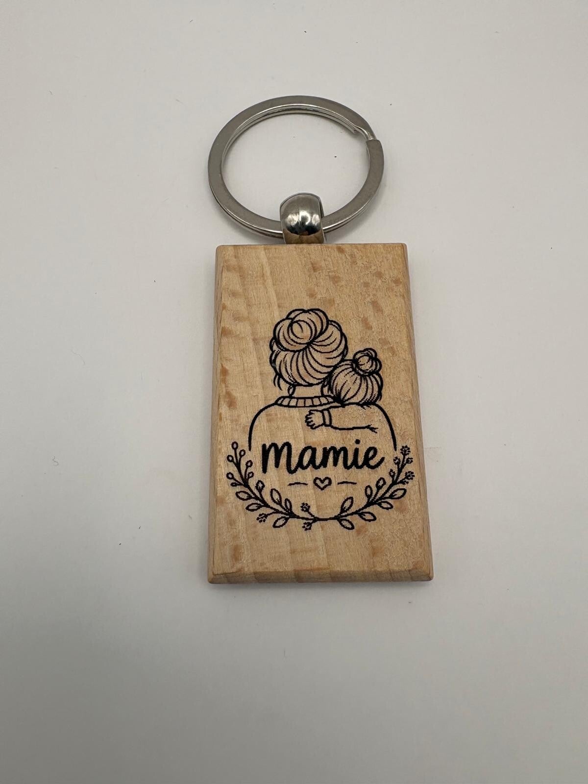 Porte-clés rectangulaire en bois gravé