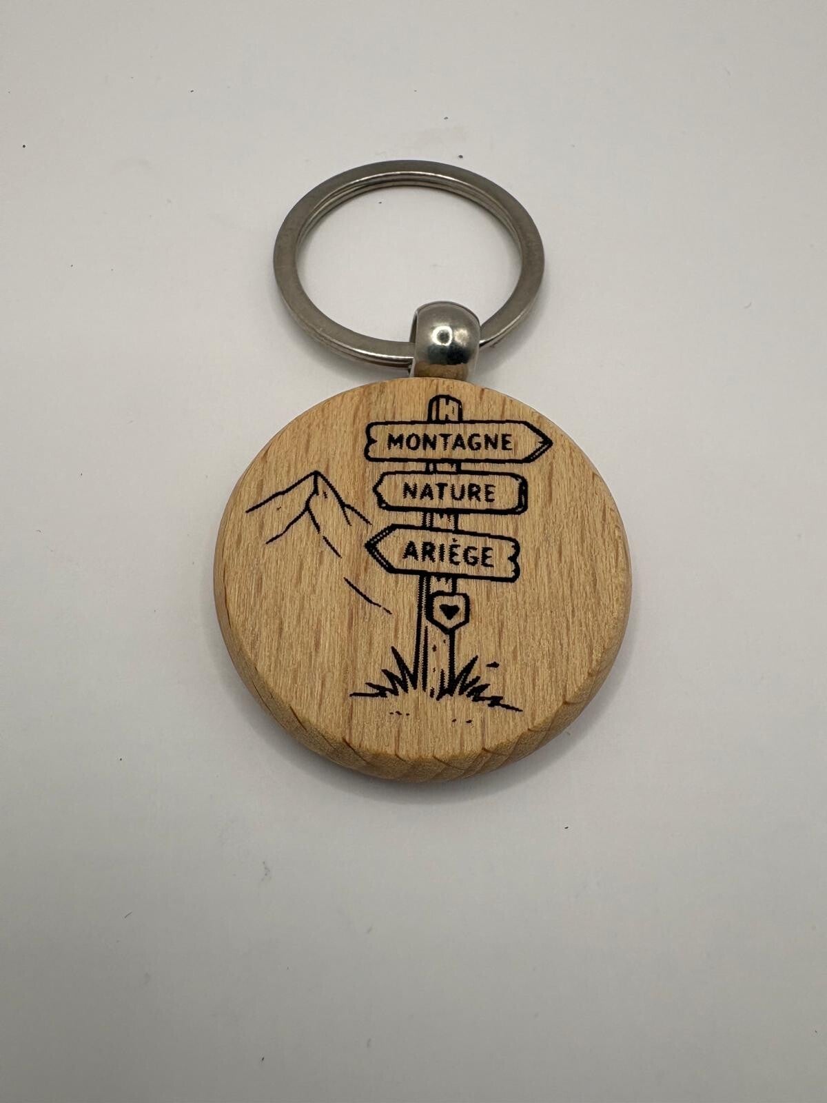 Porte-clés rond en bois gravé