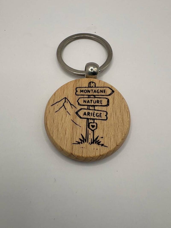 Porte-clés rond en bois gravé