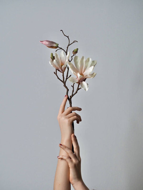 Wandkleed Hand met bloemen
