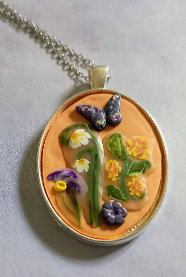The Monarch of the Garden Premium Floral Cameo Pendant