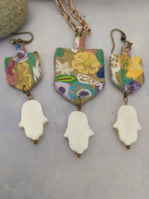The Floral Dreidel & Mother of Pearl Hamsa Set