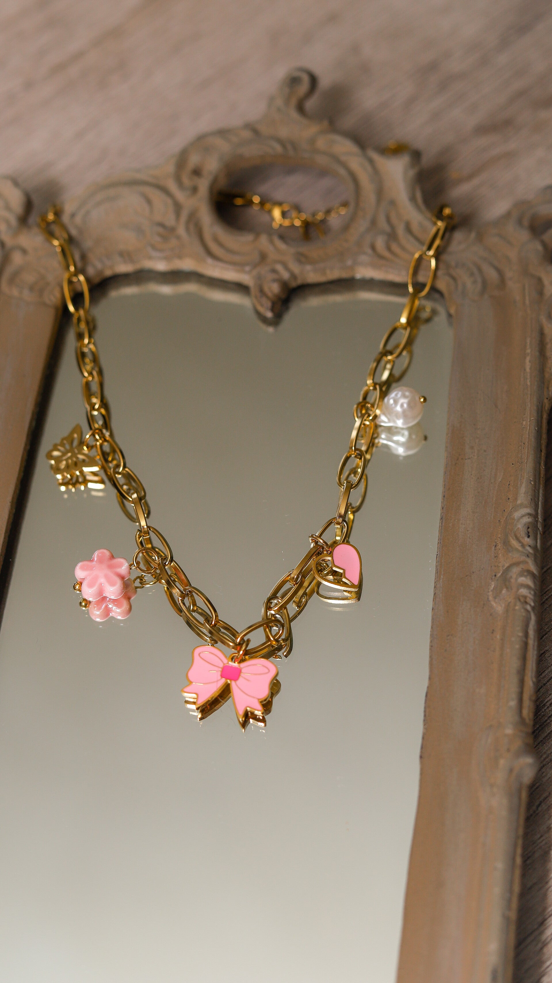 Bedelketting strik roze
