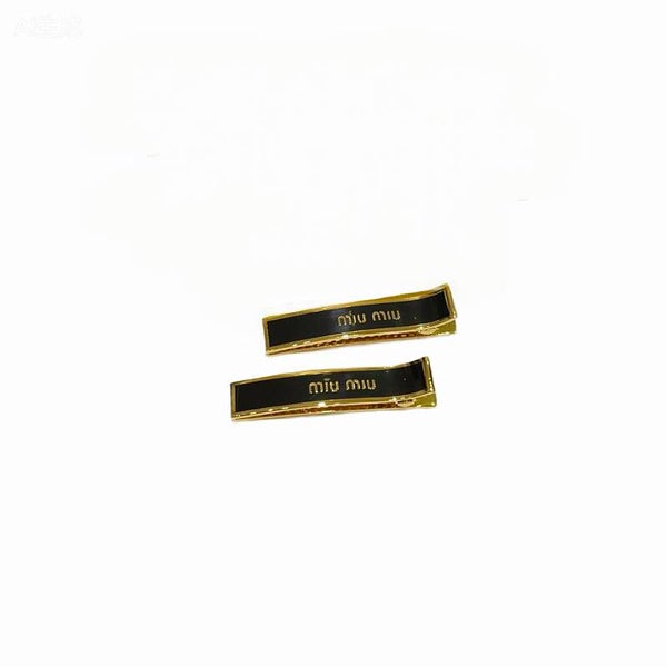 MIU MIU Enameled Metal Hair Clips Set of Two Black and Gold-Tone