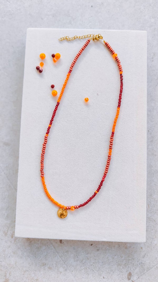 B.B. - fijne kralenketting oranje-bordeaux