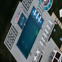 modernpoolscapenightaerial-1-1-standard.jpg