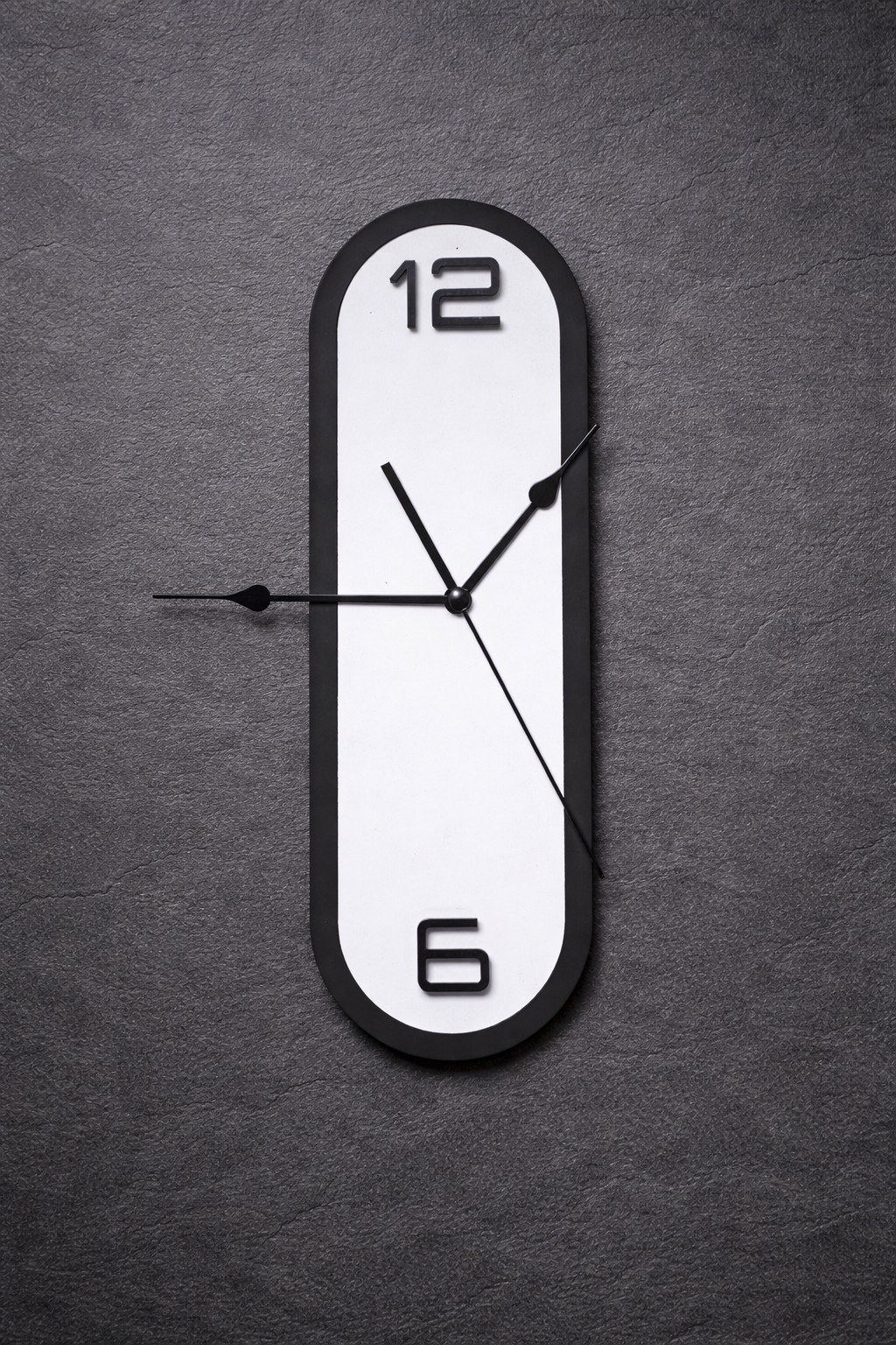 Shop this modern geometric wooden wall clock featuring a stylish black and white layered design. Perfect for living rooms, studies and home offices.