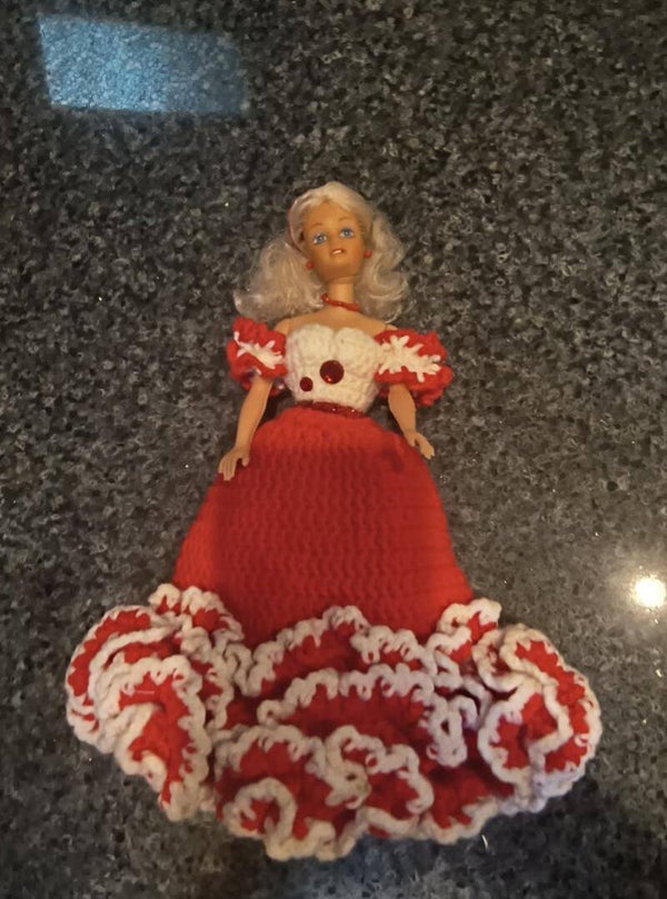 Barbie doll in handmade knitted dress