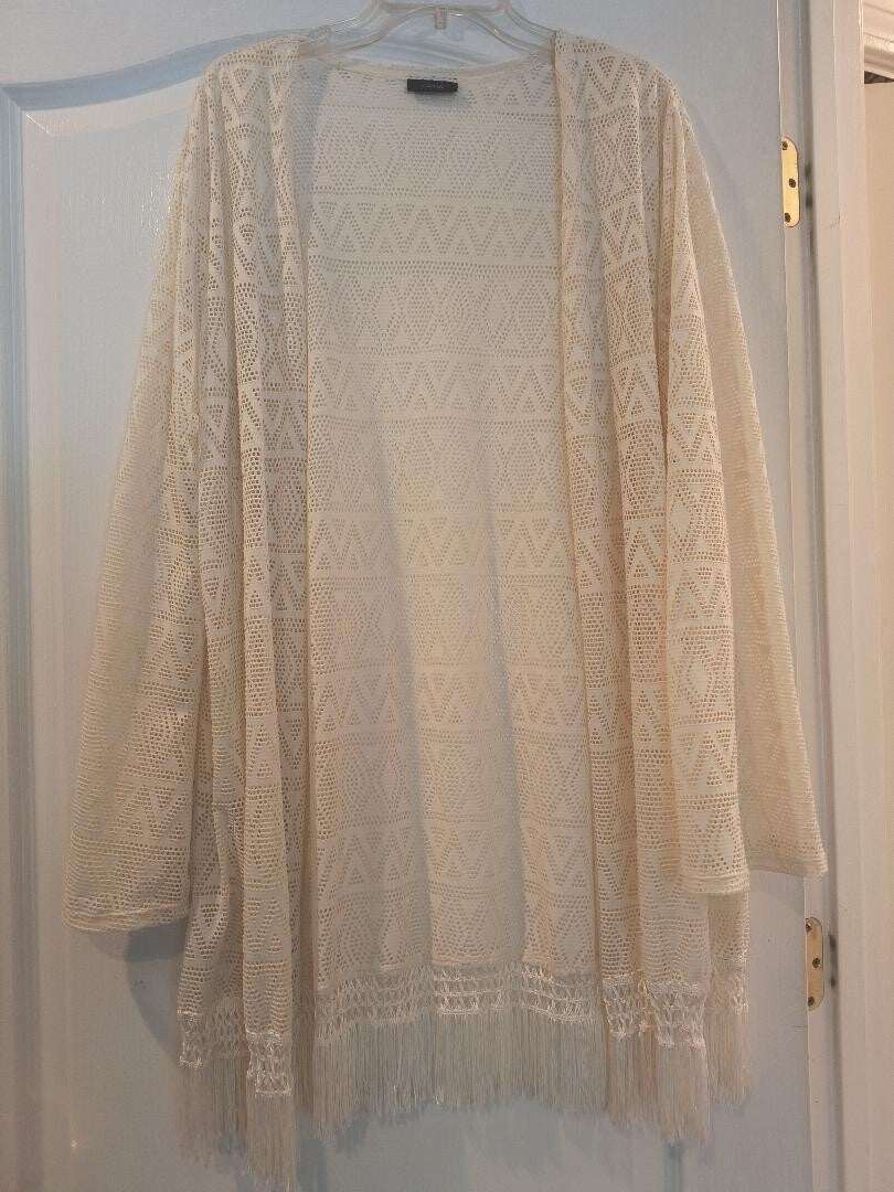 Crocheted style long overlay, open front with fringe bottom. Very 1960s style. Gorgeous!