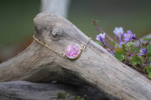 Bracelet médaillon chaine dorée