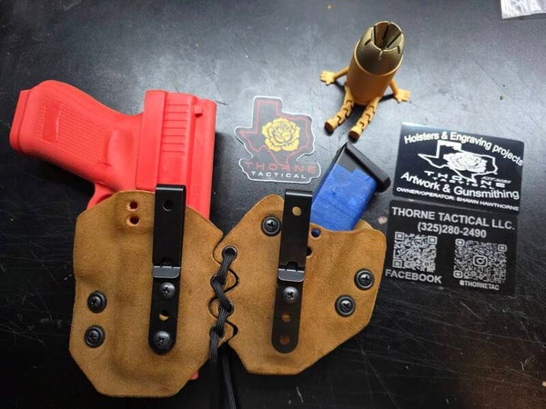 Leather wrapped kydex holster