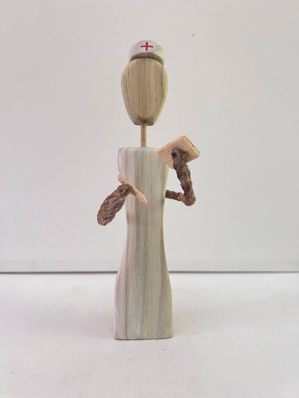 Nurse hand made wood figurine