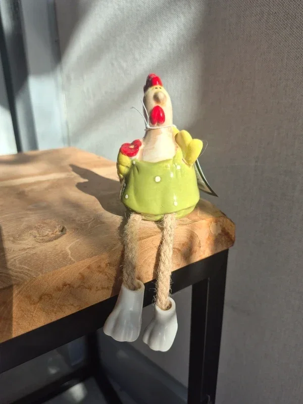 Kip met bungelbeentjes