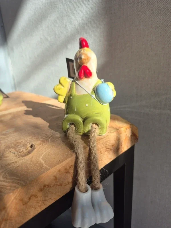 Kip met bungelbeentjes