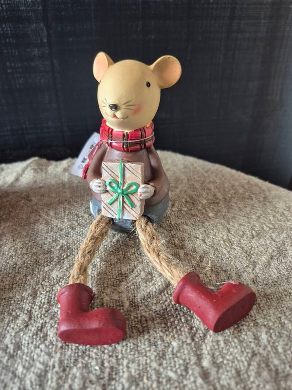 Muis Milli met bungelbeentjes