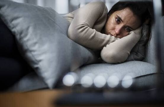 Persoon die weinig plezier of interesse ervaart bij depressieve klachten