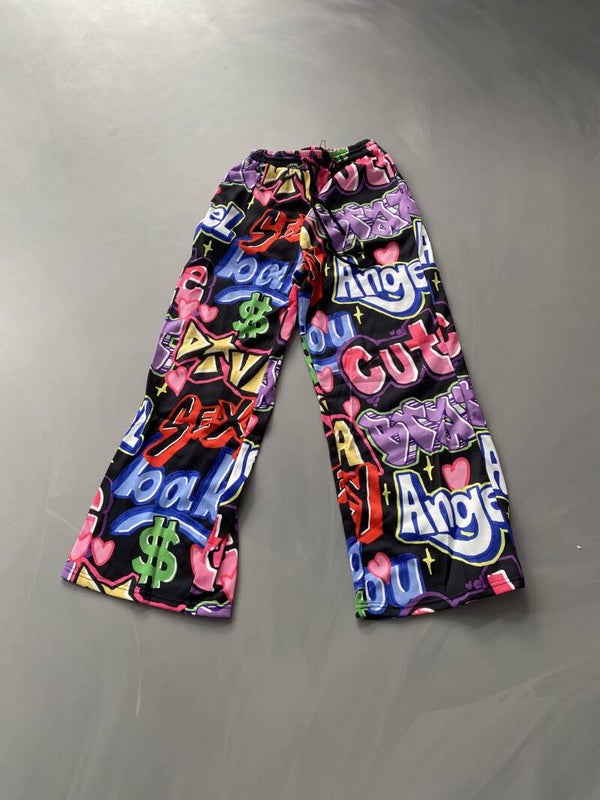 Zwarte broek met tekst in diverse kleuren 14 stuks