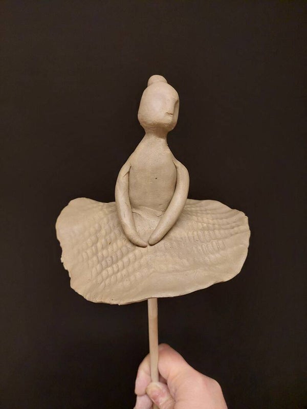 Ballerina boetseren in klei